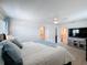 View of the main bedroom featuring a ceiling fan and entryways to other rooms at 912 Scrub Oak Hammock Rd, Davenport, FL 33837