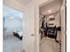This walk-in closet provides ample shelving for organization with bedroom entryway at 912 Scrub Oak Hammock Rd, Davenport, FL 33837