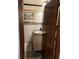 Cozy bathroom with decorative tile accents and a vintage-style vanity at 9402 Cat Track Trl, Lake Wales, FL 33898
