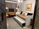 Comfortable bedroom featuring a pull-out bed, stylish décor, and warm lighting creating a welcoming atmosphere at 9402 Cat Track Trl, Lake Wales, FL 33898
