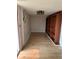 Bright, empty room with hard wood floors and built in shelves at 9402 Cat Track Trl, Lake Wales, FL 33898