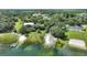 Peaceful lakefront property featuring a convenient boat ramp and direct water access at 1042 Golden Bough Rd, Lake Wales, FL 33898