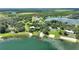 Scenic lakefront property boasting a boat ramp, dock, and stunning lake views at 1042 Golden Bough Rd, Lake Wales, FL 33898