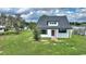 Charming two-story home with a modern design and well-manicured lawn, perfect for a growing Gathering at 1042 Golden Bough Rd, Lake Wales, FL 33898
