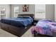 This is a spacious bedroom featuring neutral walls and large windows with blinds at 1081 Sandpiper Loop, Winter Haven, FL 33881