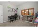 Dedicated office space with two workstations, shelving, and neutral tones at 1081 Sandpiper Loop, Winter Haven, FL 33881