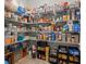 Organized walk-in pantry featuring wire shelves stocked with various food and household items at 1081 Sandpiper Loop, Winter Haven, FL 33881
