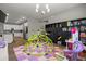 Open playroom with a climbing dome that is open to the kitchen at 1081 Sandpiper Loop, Winter Haven, FL 33881