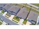 An aerial view shows the property boundaries and landscaping of this single Gathering home at 1100 Sugarwood St, Davenport, FL 33837