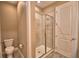 Bathroom featuring a modern glass shower and tiled floor at 1100 Sugarwood St, Davenport, FL 33837