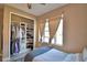 Bright bedroom with large window and spacious closet with ample storage at 1100 Sugarwood St, Davenport, FL 33837
