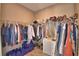 Spacious walk-in closet, perfect for organizing clothes, shoes, and accessories at 1100 Sugarwood St, Davenport, FL 33837