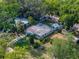 Overhead shot of the home and outbuilding among neighboring residences at 1140 W Seminole Trl, Bartow, FL 33830