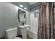 Bathroom with a shower/tub combo, pedestal sink, and toilet at 1140 W Seminole Trl, Bartow, FL 33830