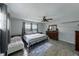 Charming bedroom with wood-look floors, plenty of light, and furnishings at 1140 W Seminole Trl, Bartow, FL 33830
