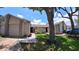 Charming townhome featuring a well-maintained lawn, neutral tones and an inviting walkway at 12241 Augusta Woods Cir, Orlando, FL 32824