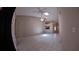 Open living area featuring tile floors, a ceiling fan, and natural light at 12241 Augusta Woods Cir, Orlando, FL 32824