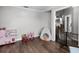 Open playroom area with plenty of room for toys and activities, perfect for Gathering fun at 125 Homewood Dr, Winter Haven, FL 33880
