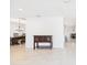 Welcoming foyer area with tiled flooring and stylish decor at 14191 Se 25Th Ave, Summerfield, FL 34491