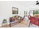 Enclosed patio with plants, featuring a view of the outdoors and ample natural light at 14191 Se 25Th Ave, Summerfield, FL 34491