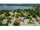 Aerial view of the home and surrounding area close to a large lake at 1491 Avenue F Ne, Winter Haven, FL 33881