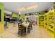 Eat-in kitchen area with tile flooring and open view into Gathering living space at 1491 Avenue F Ne, Winter Haven, FL 33881