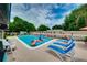 Inviting pool surrounded by lounge chairs offers a relaxing outdoor retreat at 1491 Avenue F Ne, Winter Haven, FL 33881