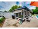 Enclosed patio offers outdoor living with protection from the elements at 1491 Avenue F Ne, Winter Haven, FL 33881
