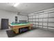 Spacious game room showcasing a pool table, perfect for entertainment and leisure at 151 Hideaway Beach Ln, Kissimmee, FL 34746