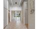 Elegant entryway with decorative tiled flooring and an inviting view of the lake at 1540 N Lake Mirror Nw Dr, Winter Haven, FL 33881