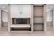 Close up view of a living room fireplace with brick features and minimalist design at 1540 N Lake Mirror Nw Dr, Winter Haven, FL 33881