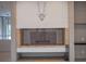 Close up of a brick fireplace and a mantel with minimalist design at 1540 N Lake Mirror Nw Dr, Winter Haven, FL 33881