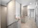 Hallway with sleek design, featuring unique architectural details and abundant natural light at 1540 N Lake Mirror Nw Dr, Winter Haven, FL 33881
