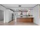 Modern kitchen with stainless steel appliances and a center island at 1540 N Lake Mirror Nw Dr, Winter Haven, FL 33881