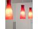 Stylish kitchen pendant lights adding a pop of color at 1540 N Lake Mirror Nw Dr, Winter Haven, FL 33881