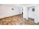 Spacious basement with tile floors, storage, and ample lighting at 1553 Wright Dr, Lakeland, FL 33805