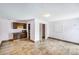 Bonus room with tile flooring, storage, and modern appliances at 1553 Wright Dr, Lakeland, FL 33805
