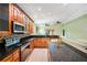 Well-equipped kitchen with granite counters, stainless appliances, and wood cabinetry at 1553 Wright Dr, Lakeland, FL 33805