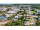 An aerial view highlights the property's proximity to downtown and local amenities at 165 E Pierce St, Lake Alfred, FL 33850
