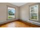Bedroom featuring hardwood floors and natural lighting at 165 E Pierce St, Lake Alfred, FL 33850