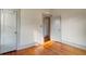 Bedroom with hardwood floors, neutral walls and good lighting at 165 E Pierce St, Lake Alfred, FL 33850