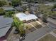 Overhead view displays the property with its well-defined boundaries, landscaping, and positioning in the community at 1929 4Th Ne St, Winter Haven, FL 33881