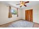 Bedroom with closet, neutral walls, and natural light from the window at 1929 4Th Ne St, Winter Haven, FL 33881