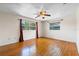 Large bedroom with wood floors, large window, and natural light at 1929 4Th Ne St, Winter Haven, FL 33881