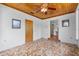 Cozy living room with wood ceiling, and unique tile flooring at 1929 4Th Ne St, Winter Haven, FL 33881