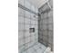 Updated shower with modern tile, and a built-in niche at 1929 4Th Ne St, Winter Haven, FL 33881