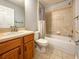 Well-maintained bathroom with tiled floors and a shower-tub combination at 2018 Misty Morning Dr, Winter Haven, FL 33880