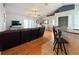 Bright living area with hardwood floors, vaulted ceilings, and an open layout that seamlessly connects to the dining and kitchen at 2018 Misty Morning Dr, Winter Haven, FL 33880