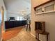 Inviting living area with hardwood floors, neutral colors, and open layout blending the living, dining, and kitchen spaces at 2018 Misty Morning Dr, Winter Haven, FL 33880