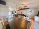 Open concept living and dining area featuring hardwood floors and modern decor at 2018 Misty Morning Dr, Winter Haven, FL 33880